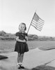 Girl holding US flag Poster Print - Item # VARSAL255421839