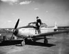 Side profile of a businessman walking on the wing of an airplane Poster Print - Item # VARSAL2553130