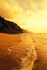 Hawaii, Kauai, Na Pali Coast, Beach At Sunset, With Foamy Surf And Cliff In Background. PosterPrint - Item # VARDPI1998083