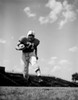 American football player on field Poster Print - Item # VARSAL255421149