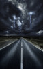 An asphalt road with stormy sky above, Tuscany, Italy. Poster Print - Item # VARPSTEVK200220S