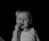Boy eating biscuit Poster Print - Item # VARSAL255424916
