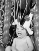 Close-up of a baby boy wearing a party hat and laughing Poster Print - Item # VARSAL25528971