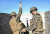 November 25, 2013 - U.S. Marine practices throwing a training grenade while fellow Marine ensures proper technique during a small-arms training exercise at Range 109, Camp Pendleton, California Poster Print - Item # VARPSTSTK108554M