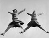 Low angle view of two female cheerleaders cheering Poster Print - Item # VARSAL25515935
