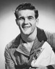 Close-up of a young man smiling and holding a clipboard Poster Print - Item # VARSAL2557130