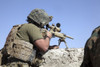 A U.S. Marine looks through the scope of an M40A1 sniper rifle Poster Print - Item # VARPSTSTK104430M