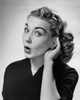 Portrait of a young woman cupping her ear to hear Poster Print - Item # VARSAL25510497
