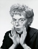 Portrait of a senior woman puckering her lips Poster Print - Item # VARSAL25511621