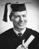 Portrait of a male graduate holding a diploma and smiling Poster Print - Item # VARSAL2553749B