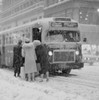 USA  New York State  New York City  People boarding bus on Fifth Avenue near 40th Street winter's day Poster Print - Item # VARSAL255419421