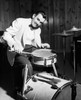Portrait of a mid adult man playing drums Poster Print - Item # VARSAL25527564