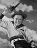Boy in cowboy costume holding toy gun Poster Print - Item # VARSAL25512964 Boy in cowboy costume holding toy gun Poster Print - Item # VARSAL25512964
