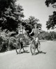 Two teenage girls riding bicycles Poster Print - Item # VARSAL2553907B