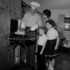 Parents with kids cooking food Poster Print - Item # VARSAL255422681