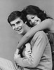 Young woman embracing a young man from behind Poster Print - Item # VARSAL25541245