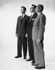 Side profile of three businessmen standing side by side Poster Print - Item # VARSAL25543605