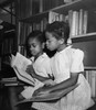 Girl with her brother reading a book Poster Print - Item # VARSAL9903446