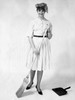 Portrait of a young woman holding a broom stick Poster Print - Item # VARSAL2551481