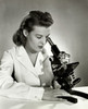 Close-up of a female scientist looking through a microscope Poster Print - Item # VARSAL2553730
