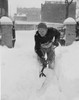 Man digging snow from garden path Poster Print - Item # VARSAL255422189