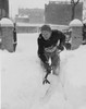 Man digging snow from garden path Poster Print - Item # VARSAL255422189