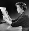 Side profile of a young woman reading a form Poster Print - Item # VARSAL25534246