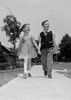 Boy and girl walking and holding hands Poster Print - Item # VARSAL25516251
