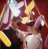 Young couple toasting with wine at New Year's party Poster Print - Item # VARSAL3844308385