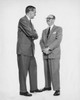 Two businessmen talking Poster Print
