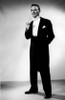 Elegant young man holding cigarette  studio shot Poster Print - Item # VARSAL255415754A