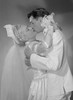 Bride and groom kissing Poster Print - Item # VARSAL255418838