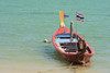 Thailand, Phuket, Rawaii Beach, Close up of longtail boats along the in water. PosterPrint - Item # VARDPI2116496