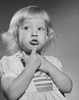 Close-up of a girl with her finger on her chin Poster Print - Item # VARSAL2554125