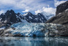 Blue glacier between snow-capped mountains and fjord; Antarctica PosterPrint - Item # VARDPI12303574