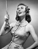 Close-up of a drum majorette performing with a twirling baton and smiling Poster Print - Item # VARSAL25524699