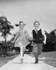 Boy and girl running on pavement Poster Print - Item # VARSAL2557549A