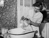 Young woman washing her son in a bathtub Poster Print - Item # VARSAL2559884A