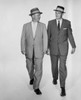 Two businessmen walking side by side Poster Print - Item # VARSAL25547990