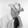 Portrait of man in cowboy hat  studio shot Poster Print - Item # VARSAL255417810