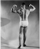 Rear view of a man flexing his muscles Poster Print - Item # VARSAL25522288A