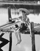 Boy sitting on a pier and fishing in a lake Poster Print - Item # VARSAL25513658