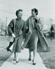 Two young women walking on pavement Poster Print - Item # VARSAL255417304