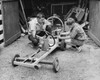 Side profile of a boy with his father making a model of a car Poster Print - Item # VARSAL25519452