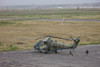 Afghan Army soldiers guard an Mi-35 attack helicopter of the Afghan National Army Air Corps at Kunduz Airfield, Northern Afghanistan Poster Print - Item # VARPSTTMO100531M