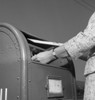 Woman putting mail into mailbox  low angle view Poster Print - Item # VARSAL255417367