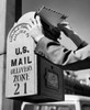 Man's hand dropping mail into a mailbox Poster Print - Item # VARSAL25511572B