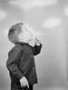 Boy blowing bubbles Poster Print - Item # VARSAL255424318