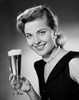 Portrait of a young woman holding a glass of beer Poster Print - Item # VARSAL2554232