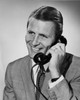 Close-up of businessman talking on the telephone Poster Print - Item # VARSAL25548279